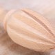 Wooden lemon squeezer