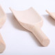 Set of three wooden grocer scoops