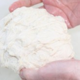 The more flour is washed away the more the gluten structure becomes visible.
