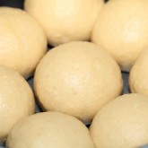 A cluster of brioche dough balls