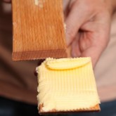 Using the butter paddles to make butter curls