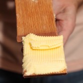 Using the butter paddles to make butter curls