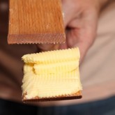 Using the butter paddles to make butter curls