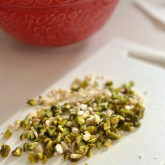 Making Easter buns with pistachio paste filling - chopping nuts
