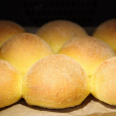 Fluffy overnight buns with pumpkin  in the oven