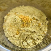 ground pistache and sugar mixture with lemon zest on top