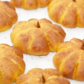 Baked pumpkin buns with pecan stems