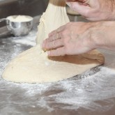and fold the flap of dough back over the dough